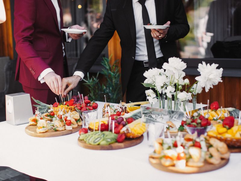 people at a buffet table