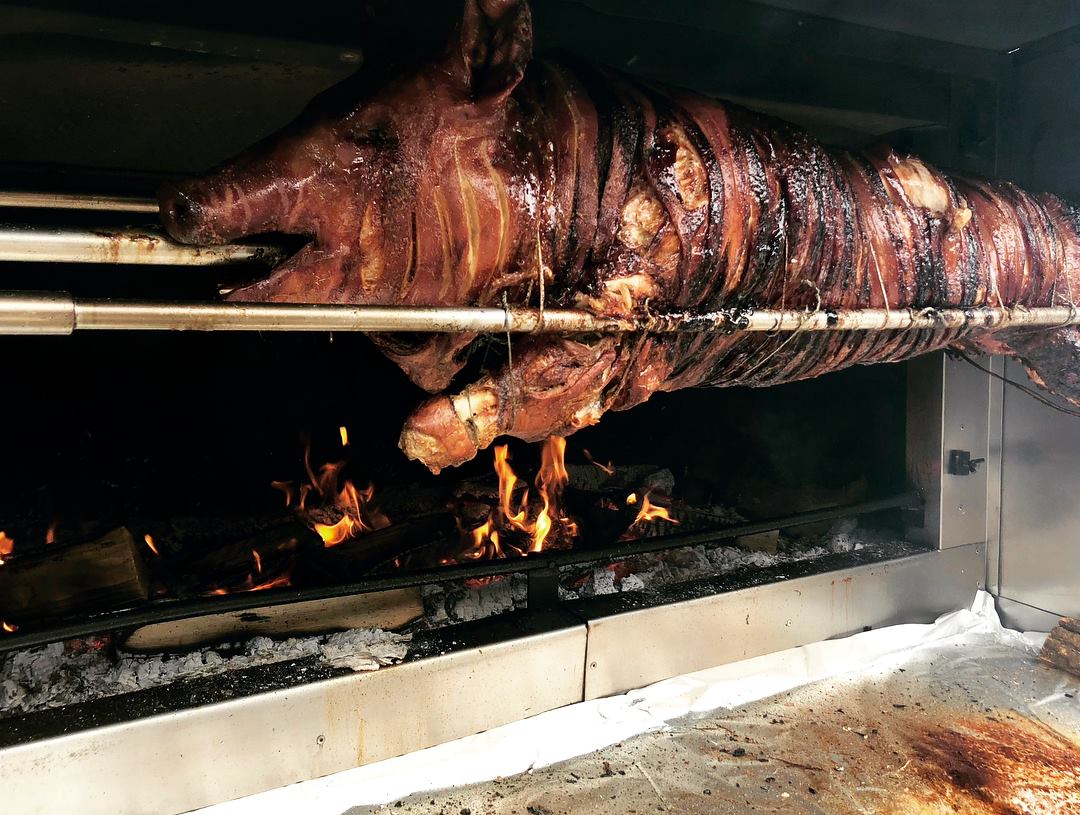 pig on a spit fire
