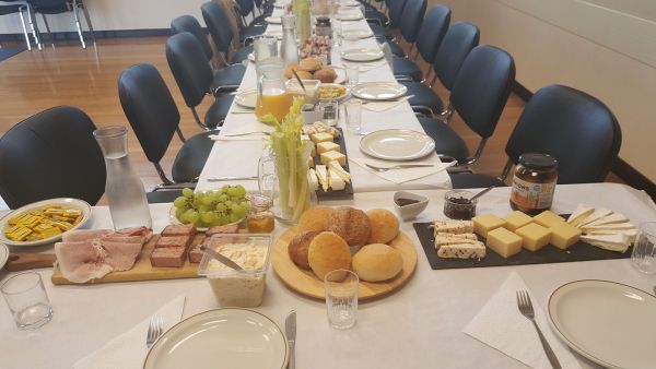 Table in boardroom with food