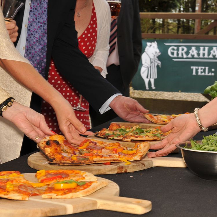 serving pizza